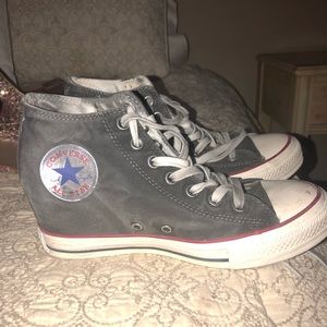 Black converse all stars with slight heel